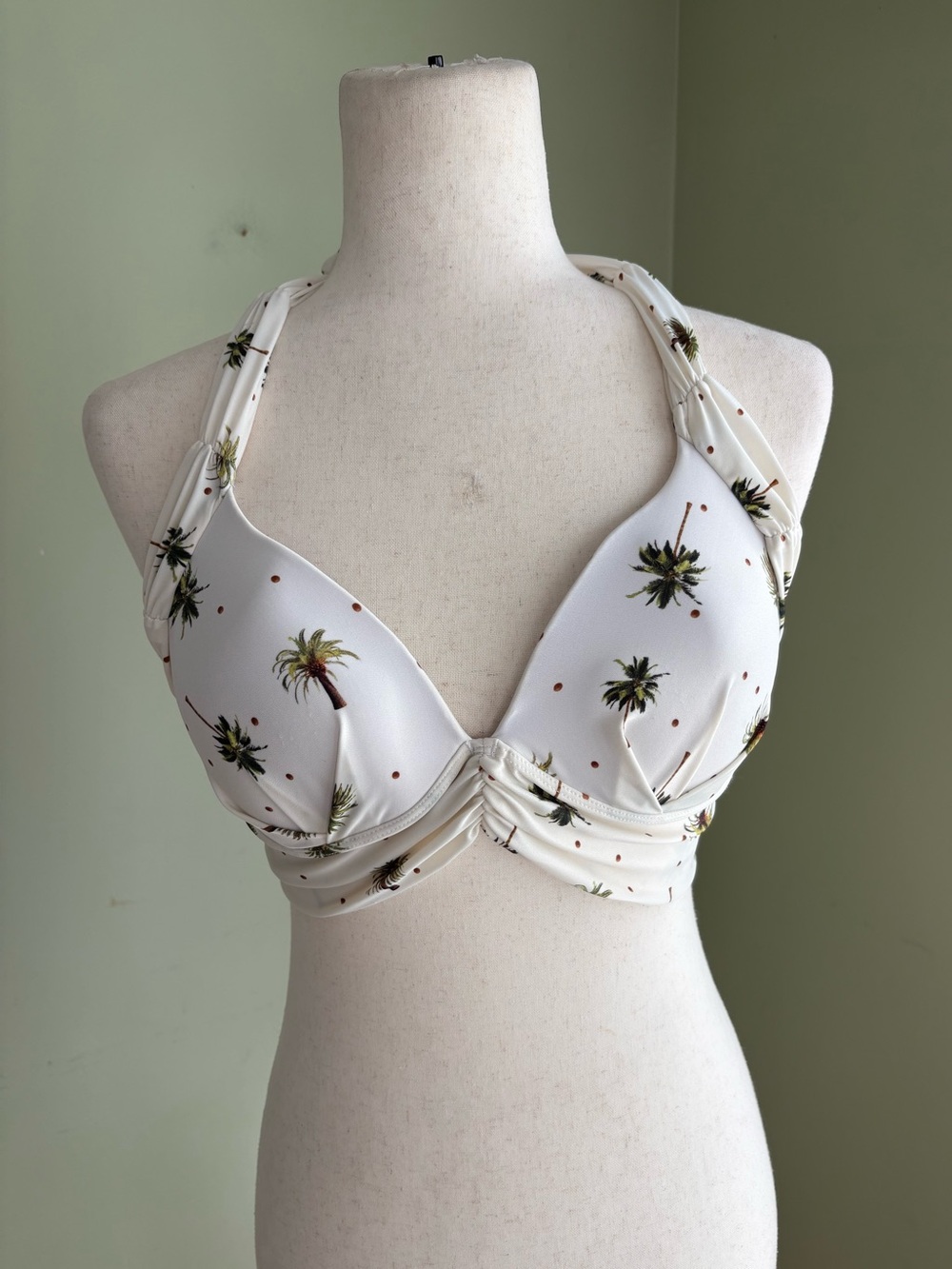 Aguament Bikini Top size L. Cream w/palm trees. Tie back. Soft cup. Brazilian